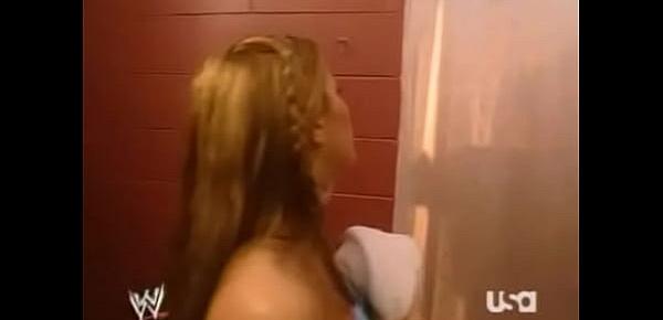  Mickie James lets Trish Stratus know she has nice boobs
